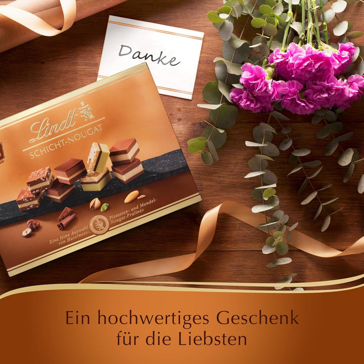 Lindt Schokolade - Schicht Pralinen | 125 G | Pralinés-Schachtel Mit 12 Von Hand Geschichteten Mandel-, Haselnuss- Und Pistazien-Nougat Spezialitäten | Pralinengeschenk | Schokoladengeschenk