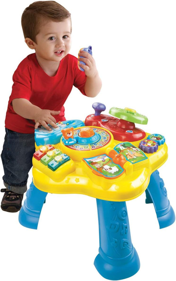 Jucărie de cale ferată VTech ABC, colorată, germană și masă de joacă pentru copii - masă de joacă colorată pentru copii cu 6 terenuri de joc și elemente interactive Jucarii Bebe Naty Shop