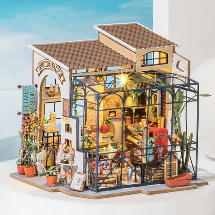 Robotime DG145 Rolife Emily's Flower Shop Miniature Doll's House Fabricat din lemn, metal, tesatura si carton, Dimensiuni: 22 X 15 X 17 Cm,