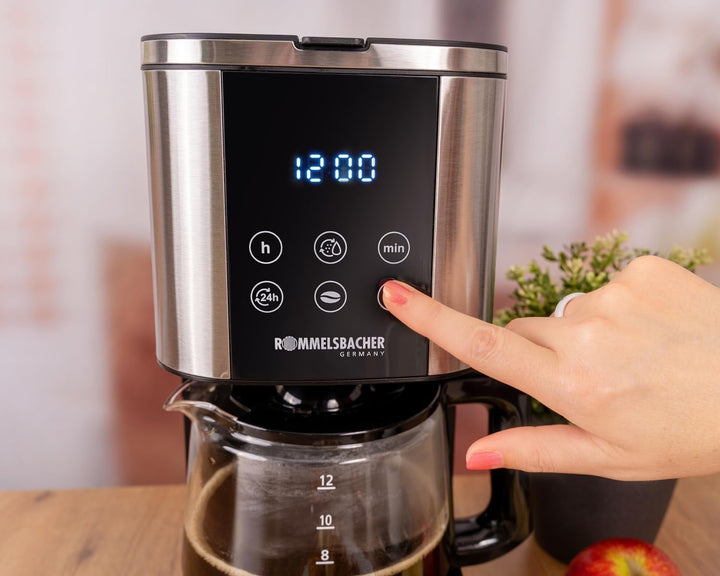 Espressor cu filtru Rommelsbacher FKM 1000 - rezervor de apă de 1,5 litri pentru 12 cești de cafea, carafă de sticlă, preselectare oră de pornire, funcție de încălzire, funcție de aromă, suport detașabil pentru filtru 1X4