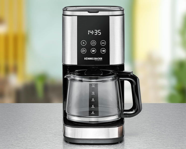 Espressor cu filtru Rommelsbacher FKM 1000 - rezervor de apă de 1,5 litri pentru 12 cești de cafea, carafă de sticlă, preselectare oră de pornire, funcție de încălzire, funcție de aromă, suport detașabil pentru filtru 1X4